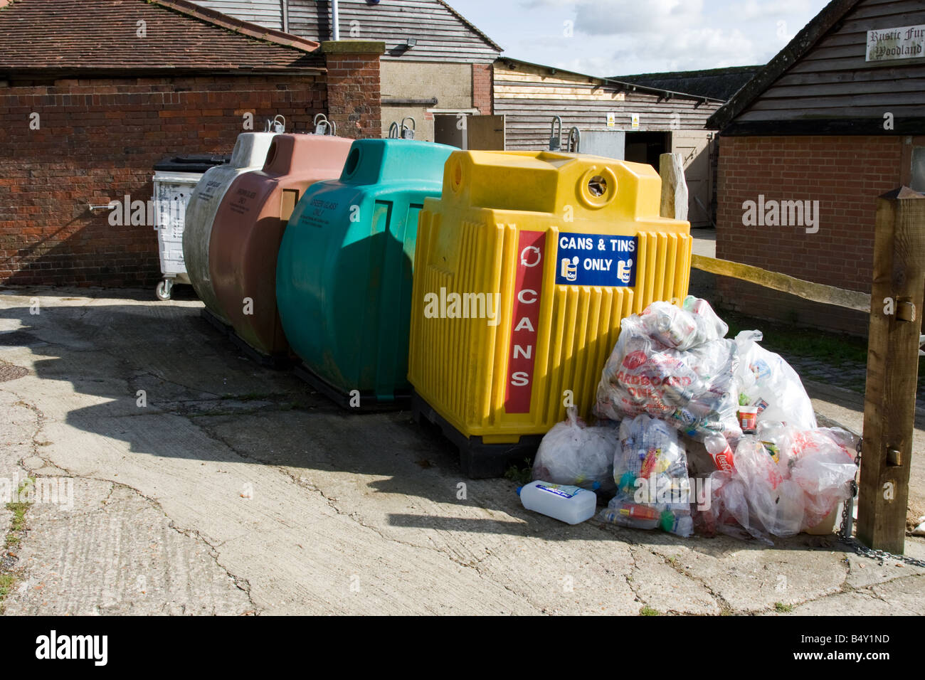 Can and tin and glass recycling bins Stock Photo Alamy