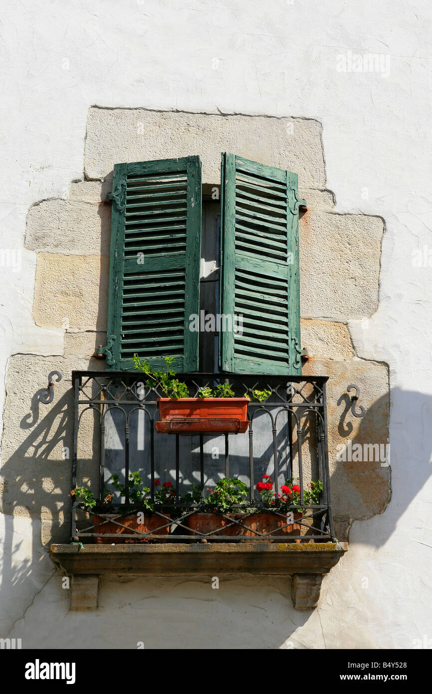 house façade with wood shutters Stock Photo - Alamy