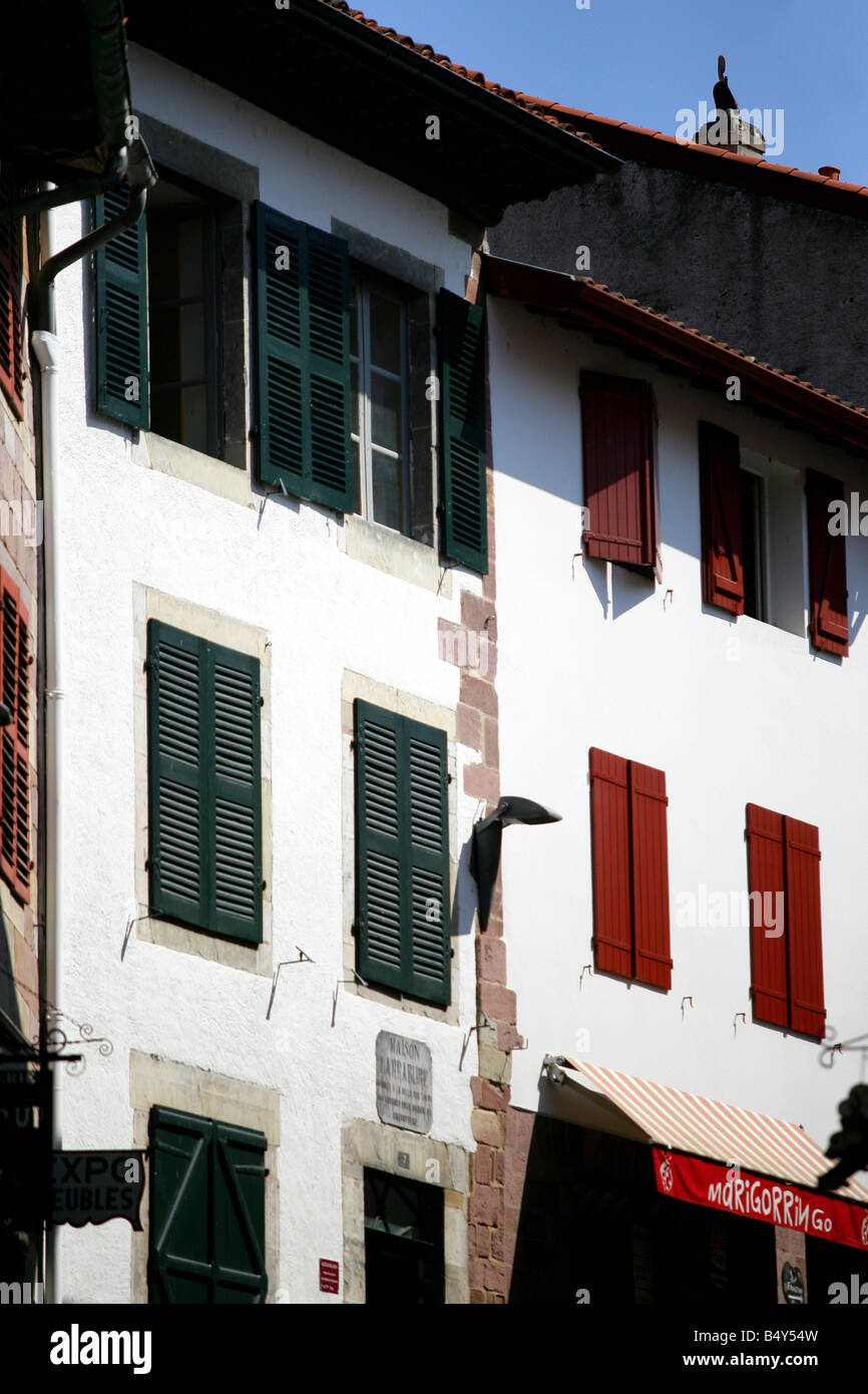 houses façades with wood shutters Stock Photo - Alamy