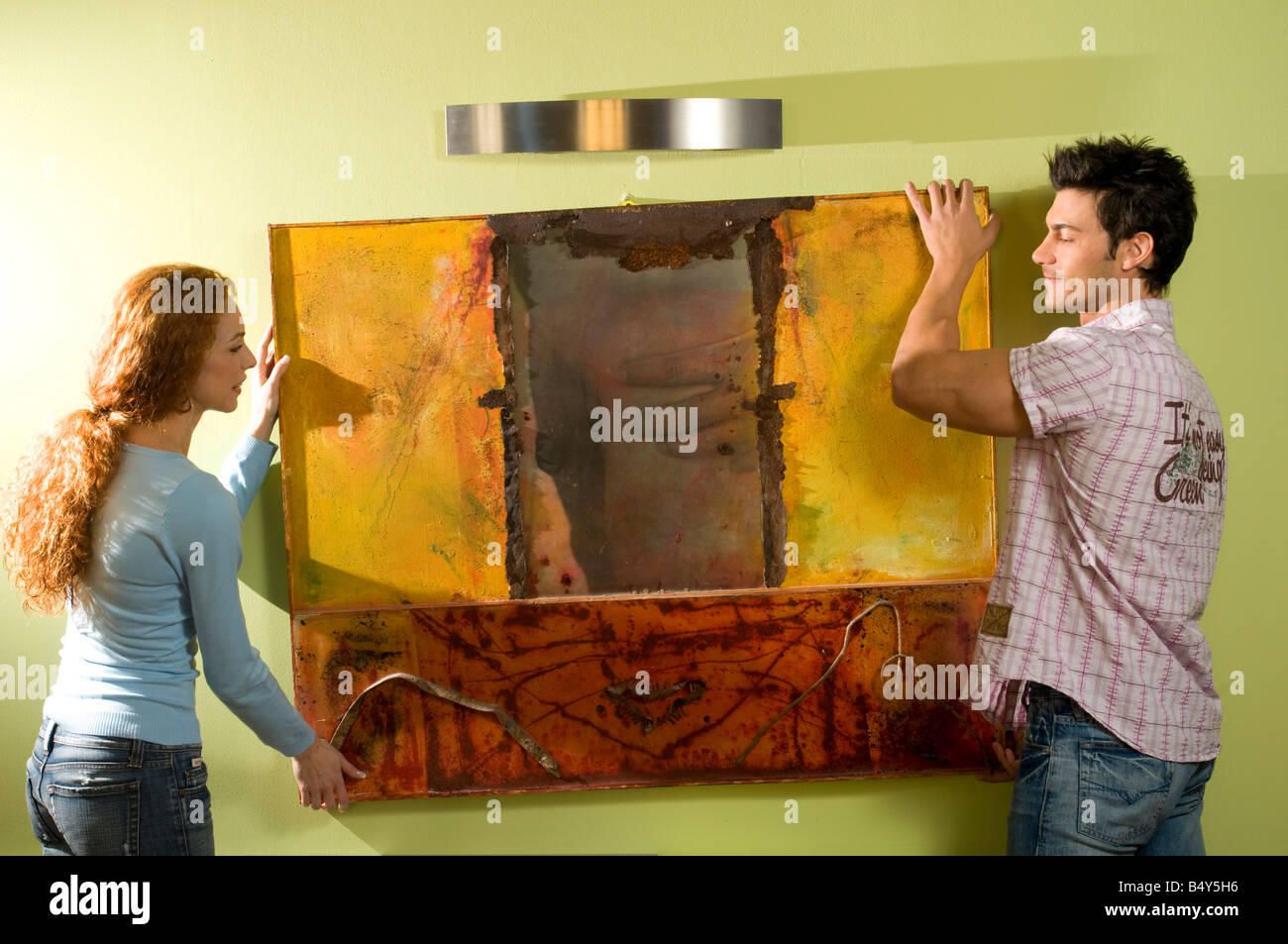 Two men one woman painting hi-res stock photography and images - Alamy