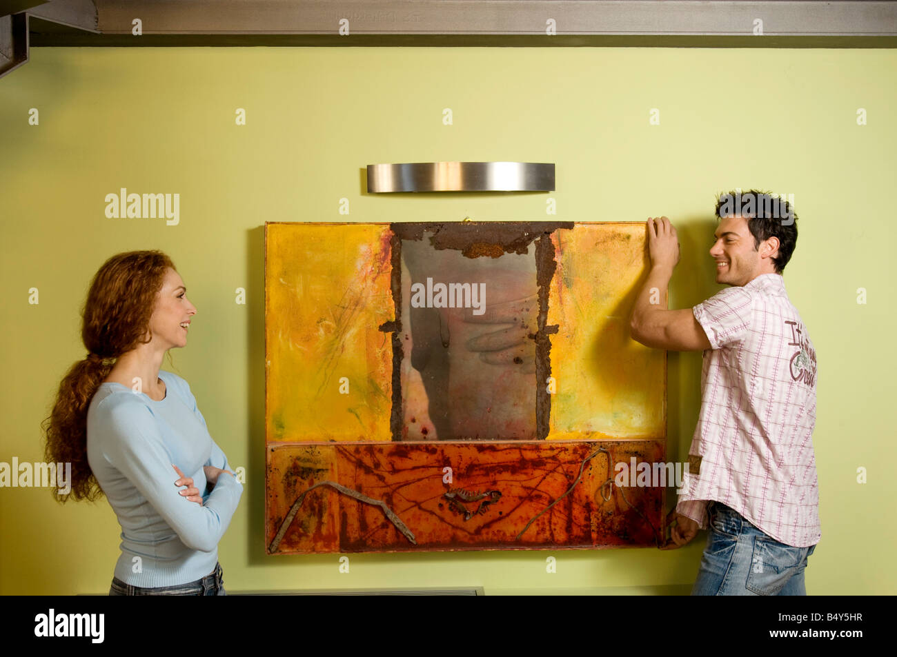 Two men and one woman painting hi-res stock photography and images - Alamy