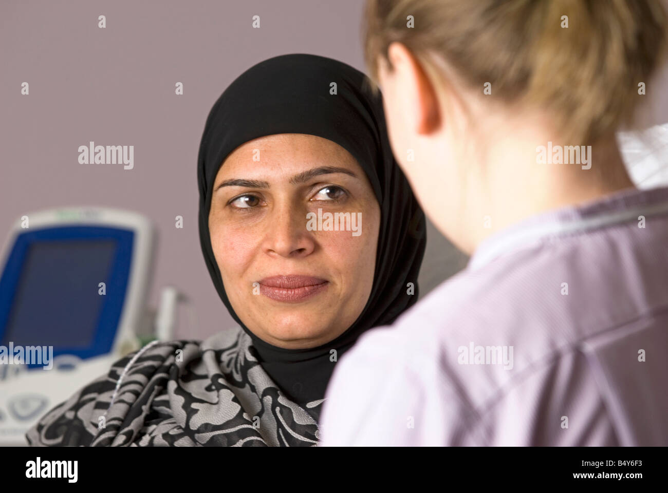 Asian woman in a hospital bed Stock Photo Alamy
