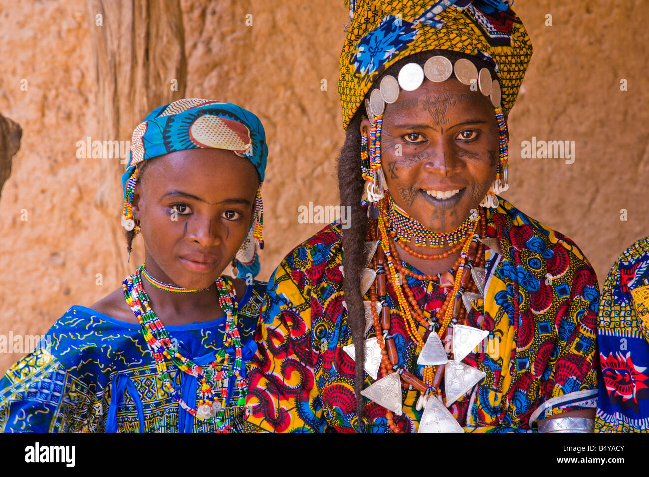 Two girls in southwestern Niger dress up in their finest clothing and  jewelry to attend the weekly market in Torodi Stock Photo - Alamy