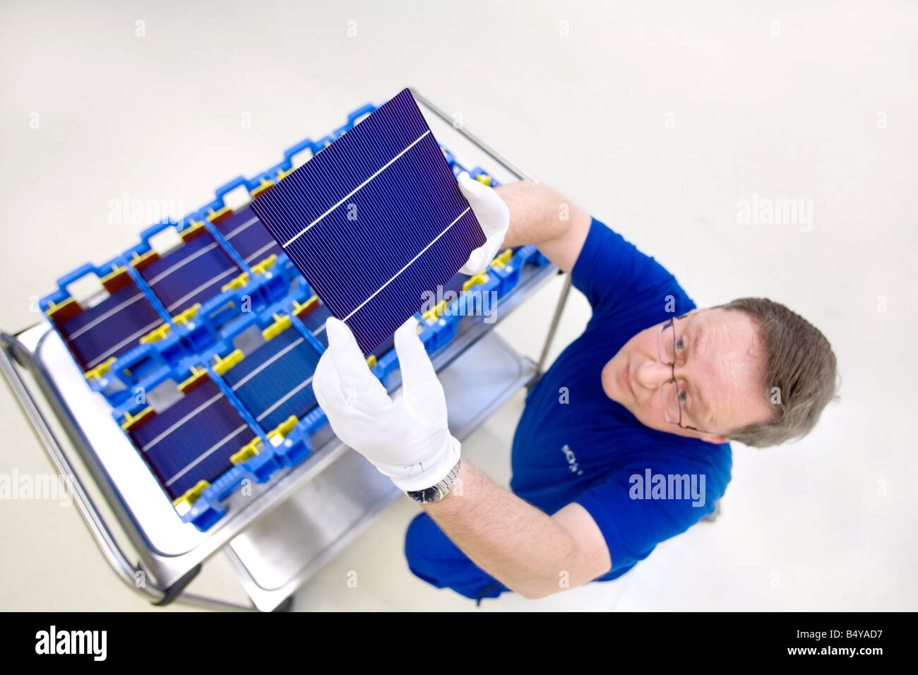 Schott Solar Ag Production Of Solar Cells Worker With Solar Cells Stock Photo Alamy