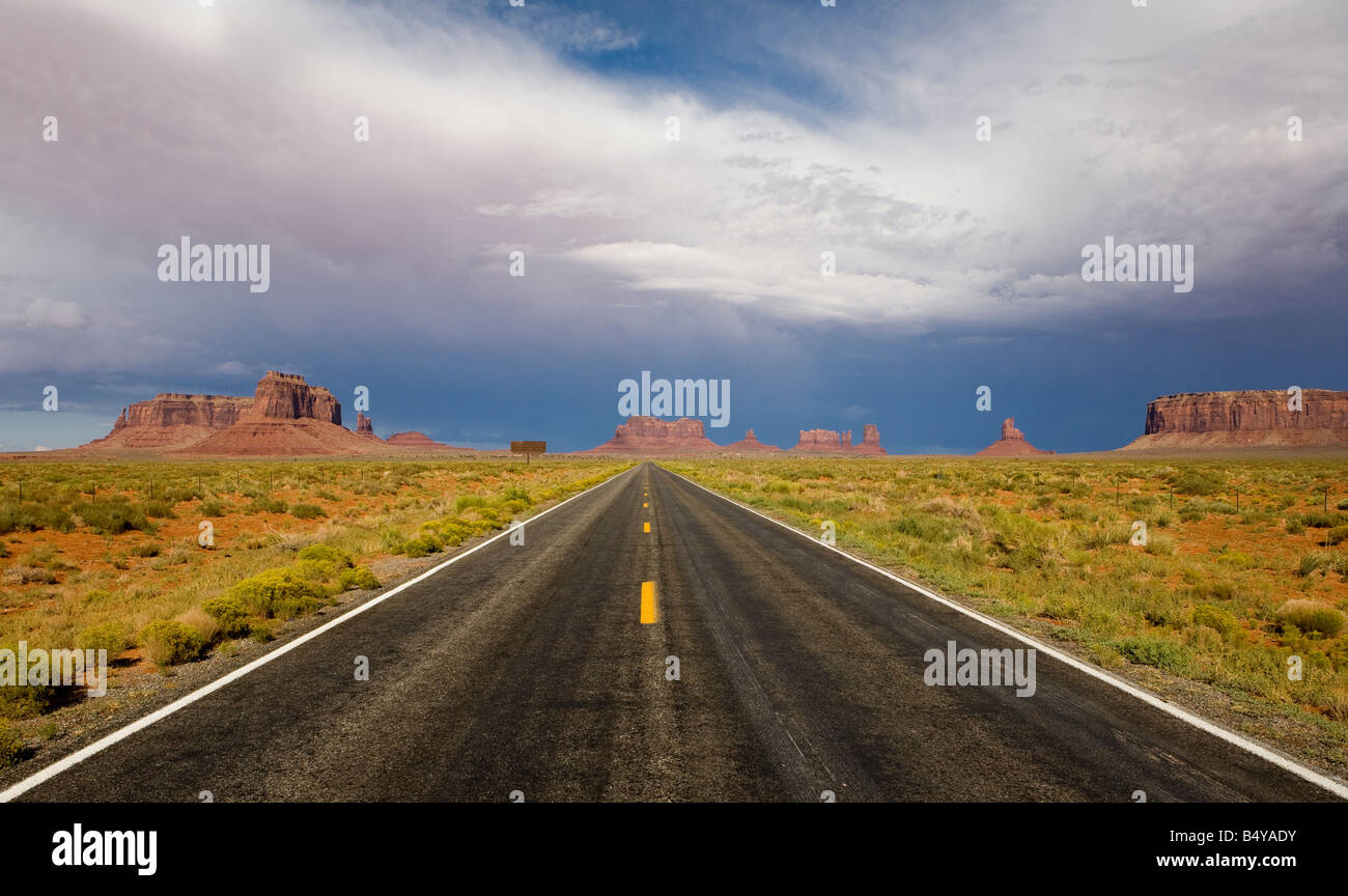 Straight road through Monument Valley Stock Photo