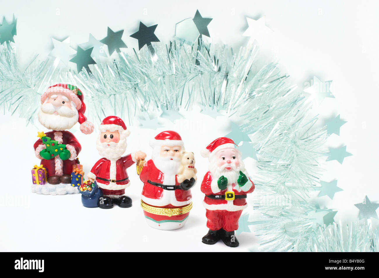 Santa Figures with Tinsel Stock Photo