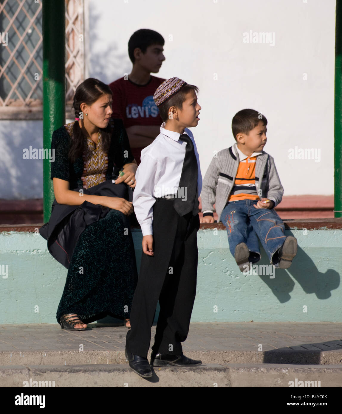people waiting at bus stop, Ashgabat, Turkmenistan Stock Photo