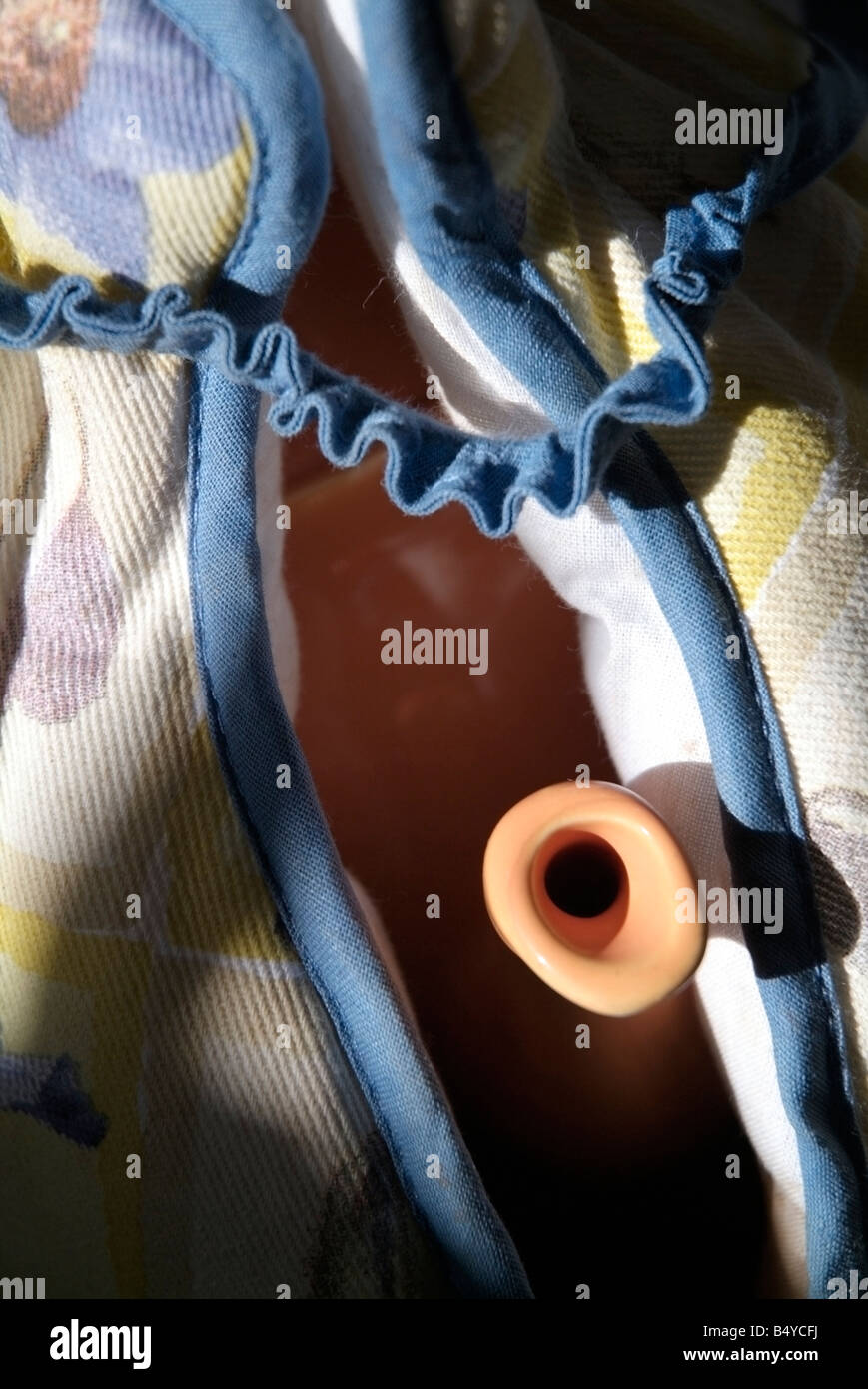 teapot inside tea cosy Stock Photo Alamy