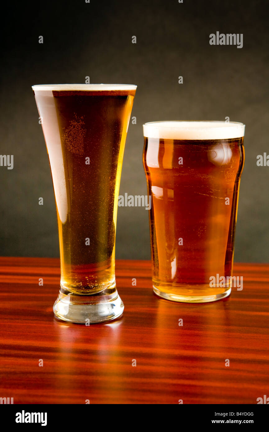 Pint of beer and a glass of lager Stock Photo