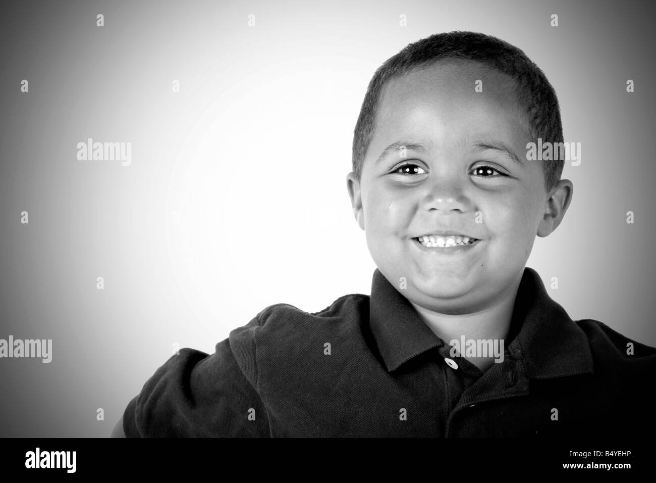 Happy latino boy portrait in black and white Stock Photo