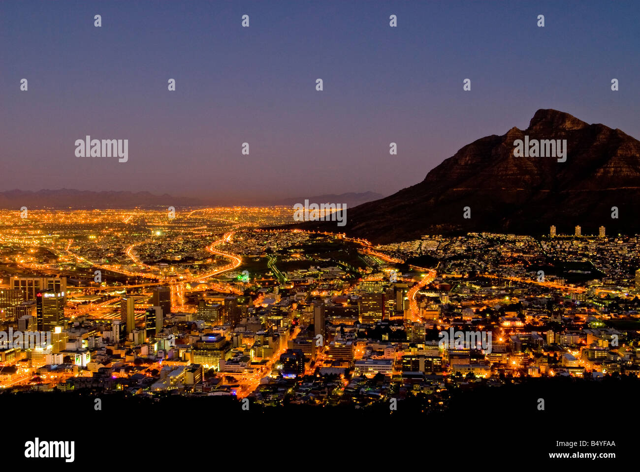 Nightly streets and CBD beneath Devil's Peak in Cape Town, Western Cape, South Africa Stock Photo
