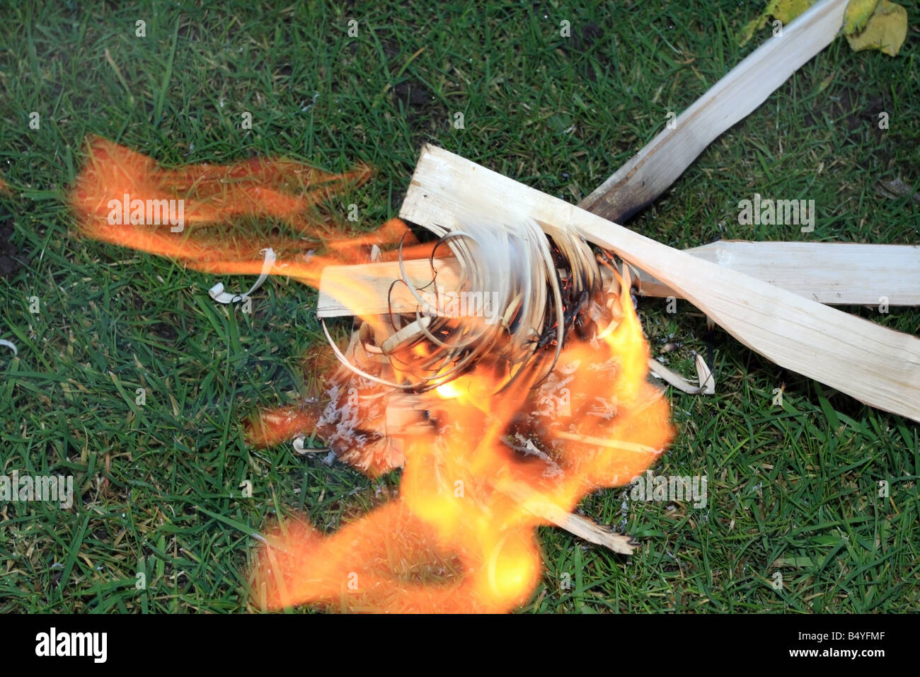 Feather Sticks Being Used to Help Start a Fire Stock Photo - Alamy