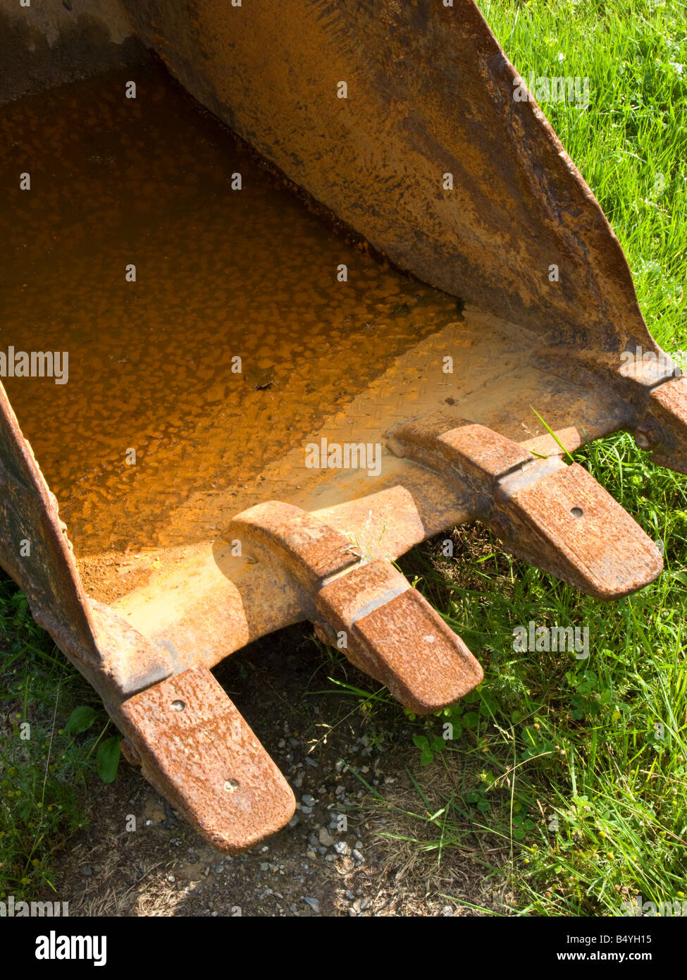 bucket of a front end loader on the ground Stock Photo