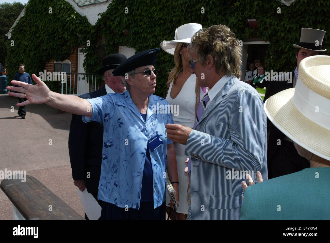 Royal Ascot Racing June 2002 Rod Stewart and girlfriend Penny Lancaster are turned away from the Royal Enclosure by Steward Mo Merchant Stock Photo