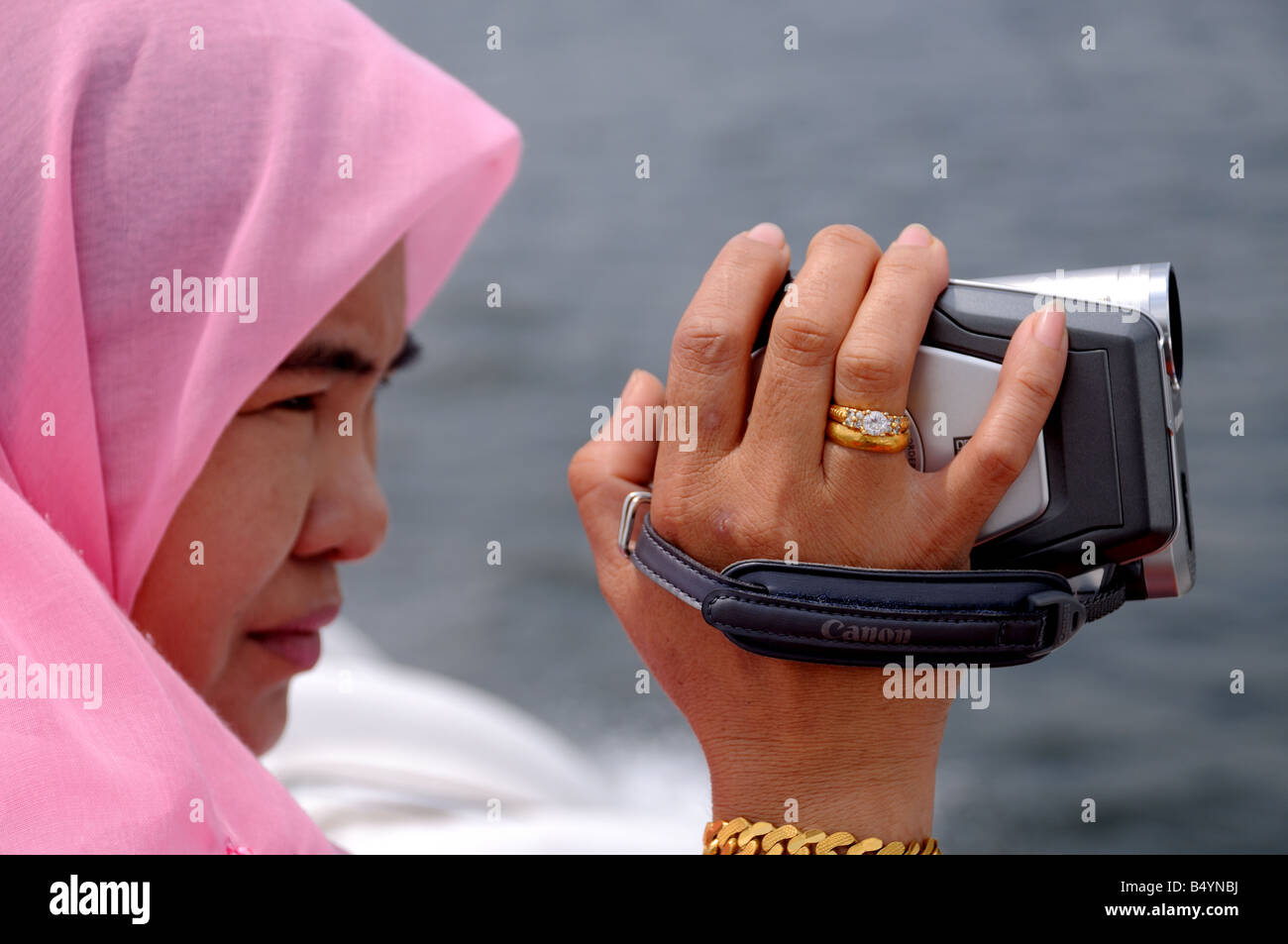 woman on ferry riau indonesia Stock Photo