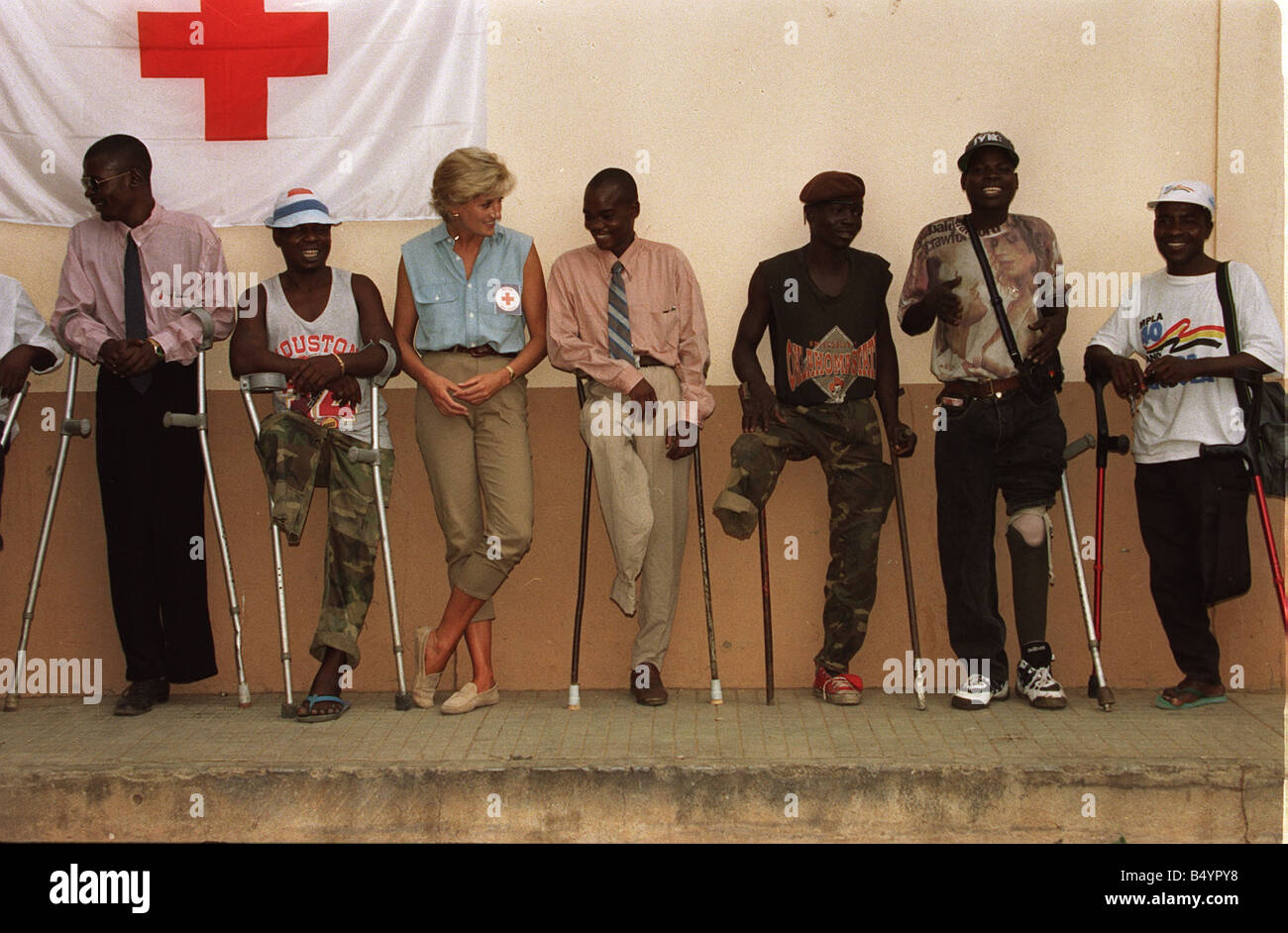 Princess Diana visiting landmine victims at the orthopaedic centre at Ruanda Angola War Conflict Angola Civil War Amputees Crutches Royalty Princess Diana Princess of Wales Charity January 1997 1990s everettselected Stock Photo