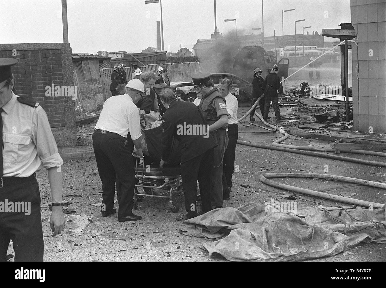 Oxford Street Bus Station Belfast Bombing July 1972 Ambulancemen carry ...