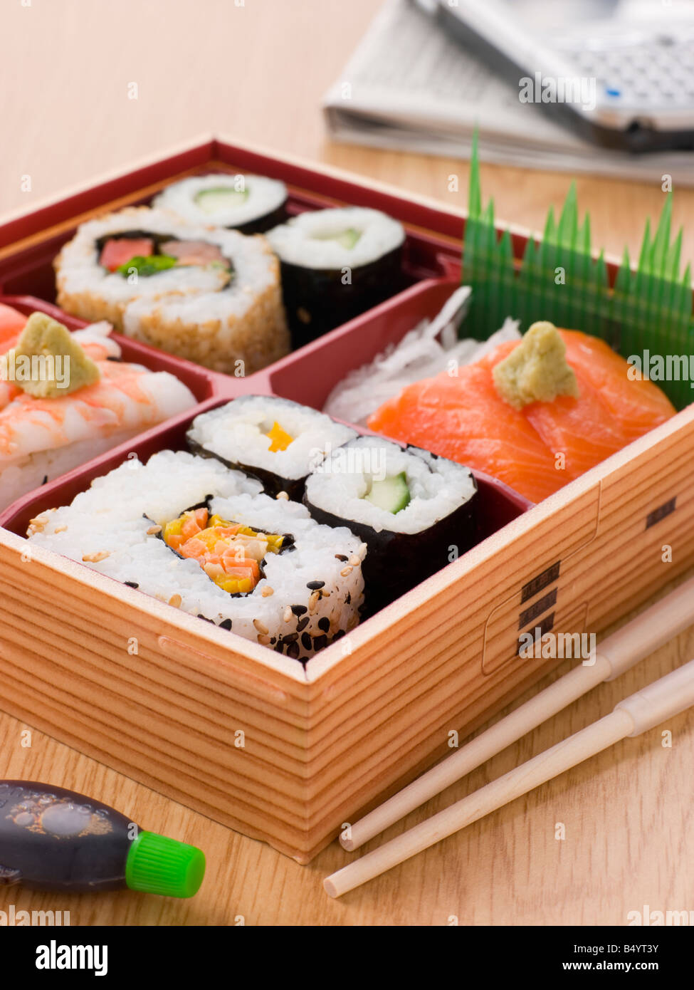 Sushi And Sashimi In A Take Away Bento Box Stock Photo
