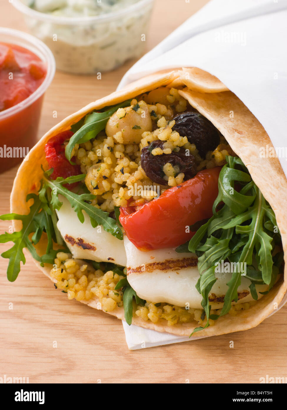 Spiced Cous Cous And Grilled Halloumi Tortilla Wrap Stock Photo