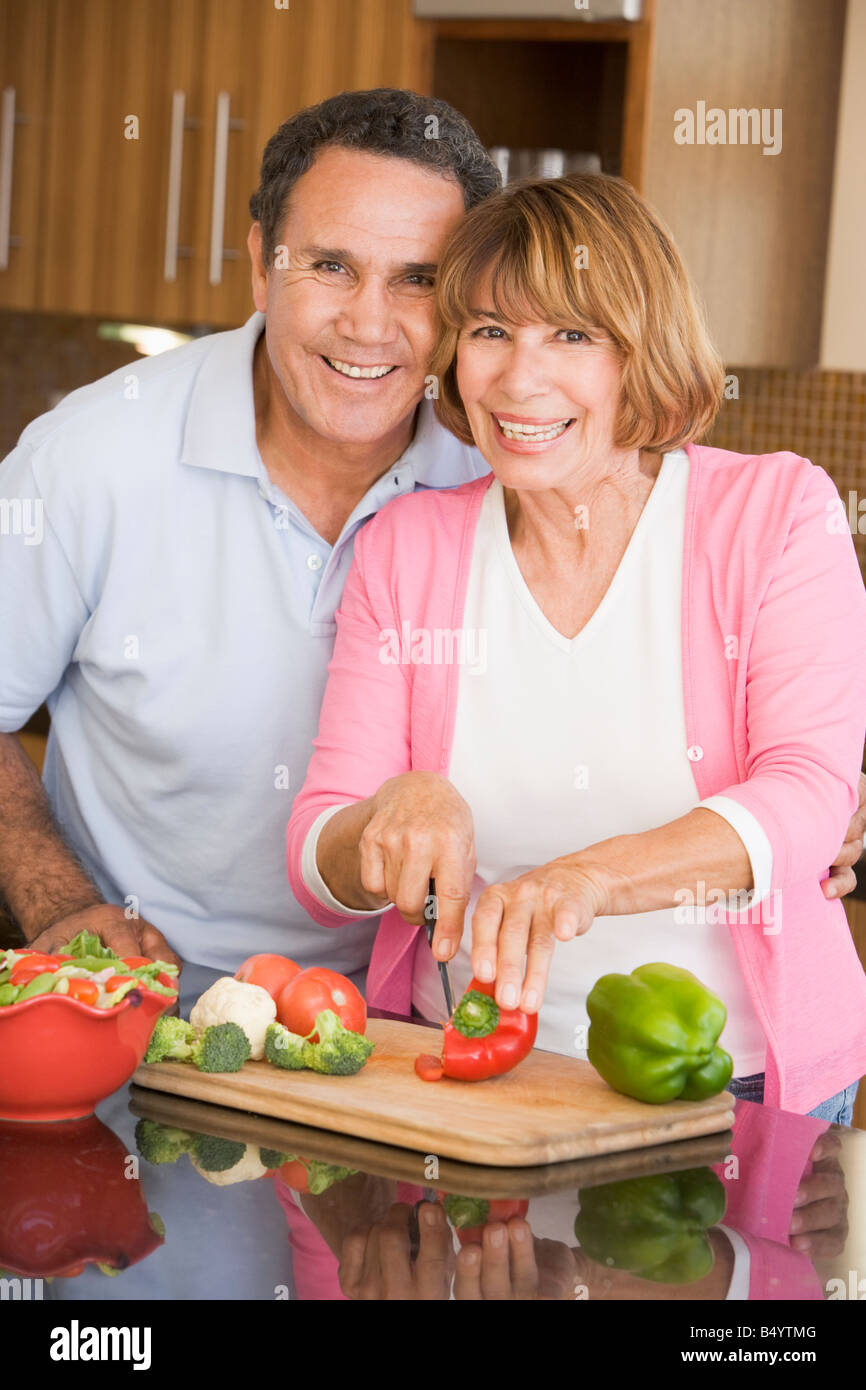 husband-and-wife-preparing-meal-together-stock-photo-alamy