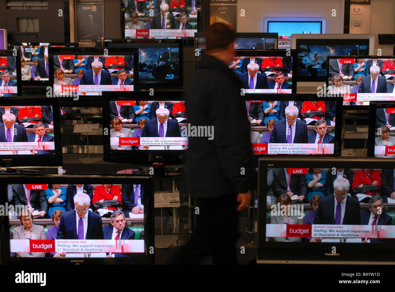 TV screens in a shop, showing the Budget Stock Photo Alamy