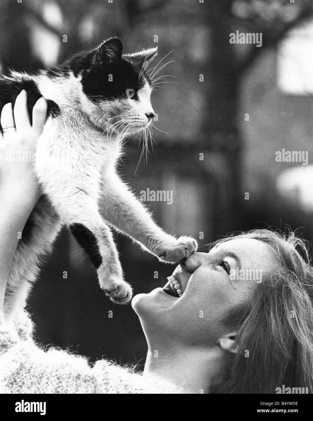 Animals - Cats. 15 years old Sarah Bower with her cat Marcus which spent 3 1/2 week trapped inside a wall at Barnage, Manchester. January 1984 P000402 Stock Photo