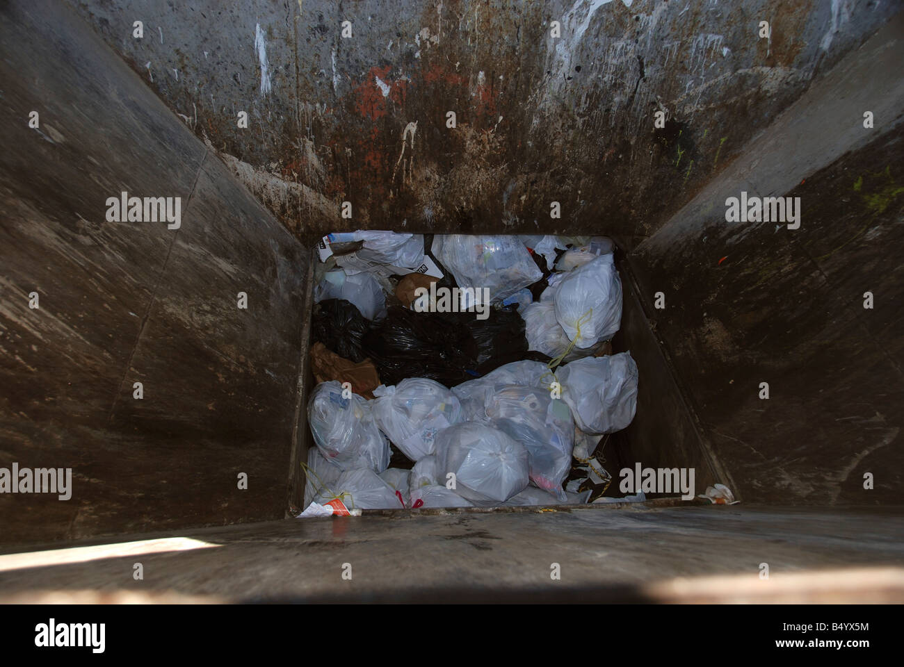 trash in compactor Stock Photo Alamy