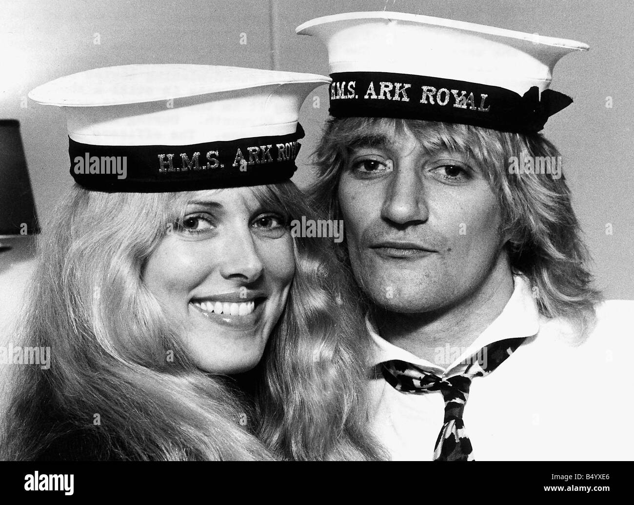 Rod Stewart singer with Alana Hamilton wearing Royal Navy HMS Ark Royal