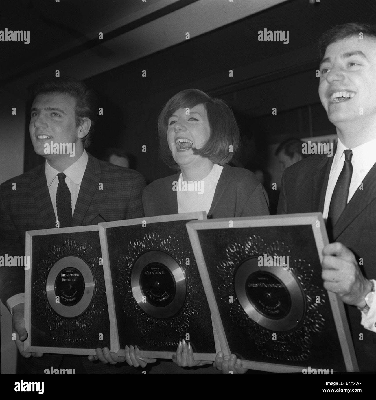 Pop stars Cilla Black Billy J Kramer and Gerry Marsdenof Gerry and the pacemakers pictured at EMI recording studios in 1964 Stock Photo