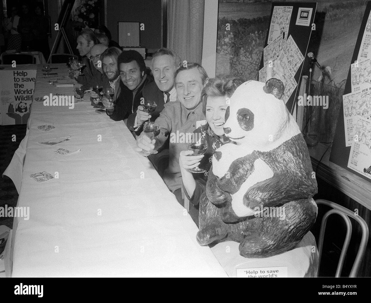 European Conservation December 1969 Wildlife reception 19 12 1969 Seated at  the table R L Cilla Black Spike Milligan Bruce Forsyth Kenny Lynch Bee Gee  Maurice Gibb Sir Landsborough Thompson George Martin Stock Photo - Alamy