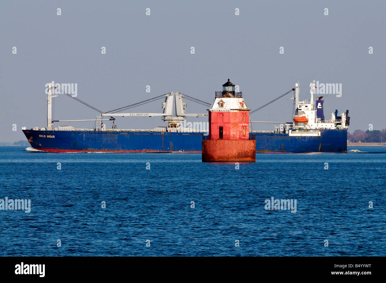 A cargo ship navigates it's way north in the Chesapeake Bay towards Baltimore Maryland Stock Photo