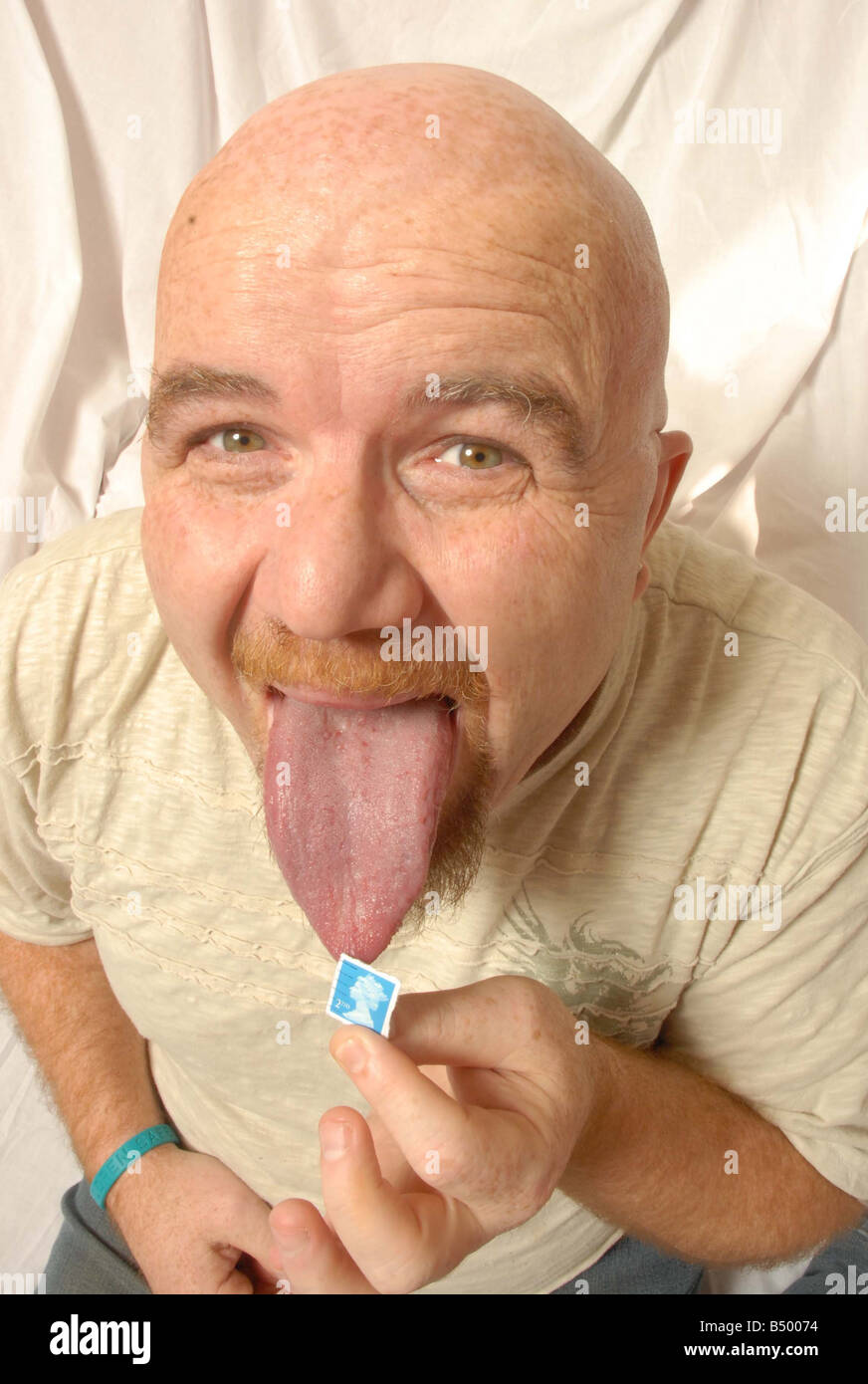 Steve Taylor who has the longest tongue in the world Seen here licking a stamp Stock Photo