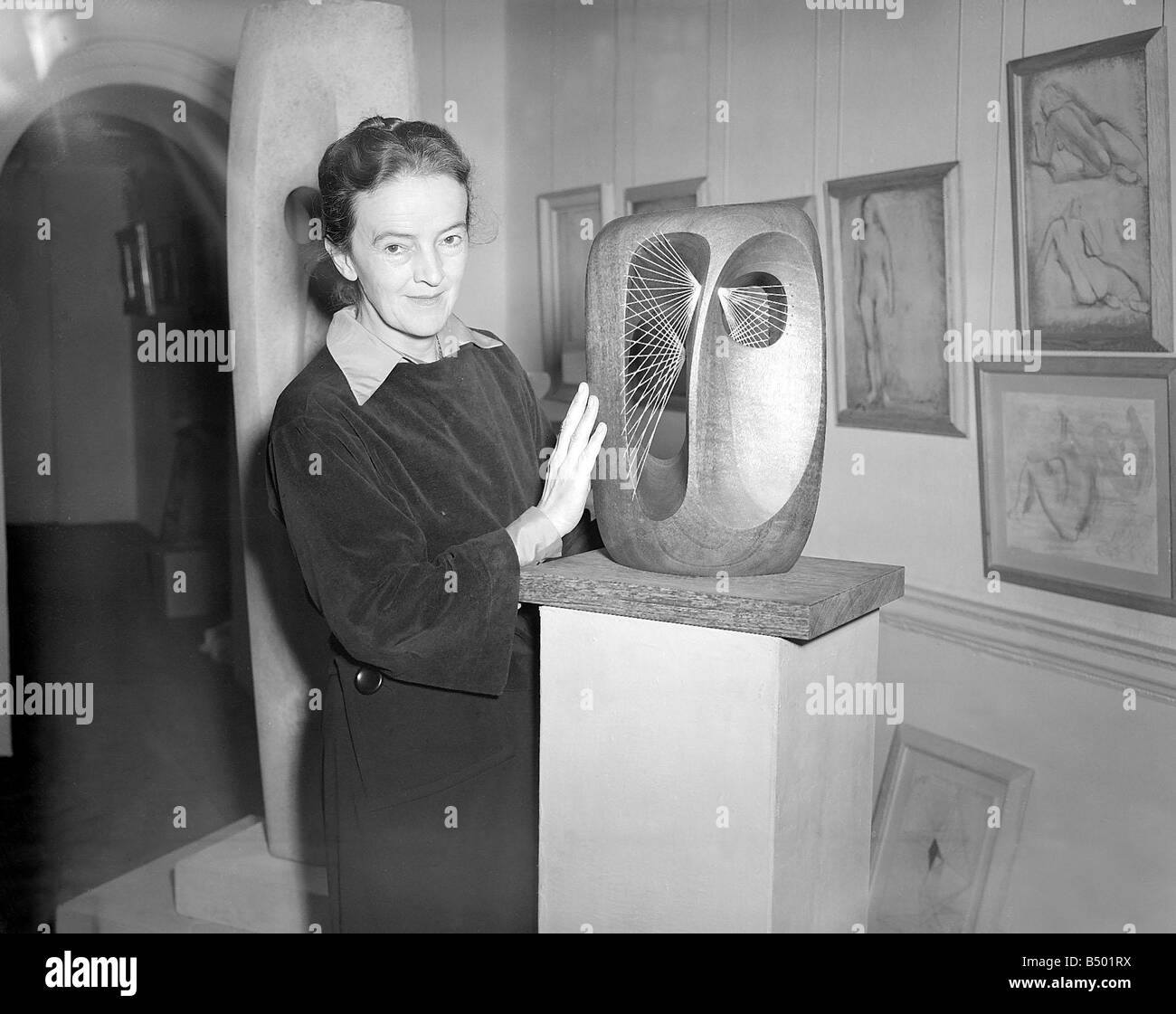 Barbara Hepworth Artist and Sculpturer September 1952 with her work at