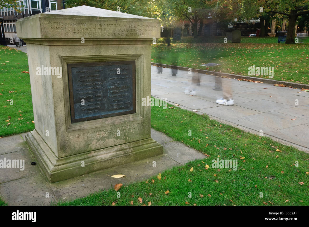 A memorial plaque, commemorating the victims of the bombings, situated in the grounds of St. Philip's Cathedral, Birmingham Stock Photo