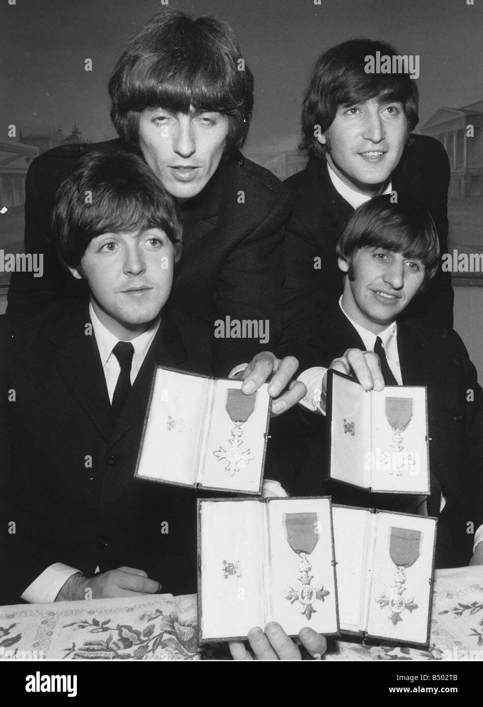 Beatles holding their MBE s Membership of the British Empire medals October 1965 MBE medals Stock Photo