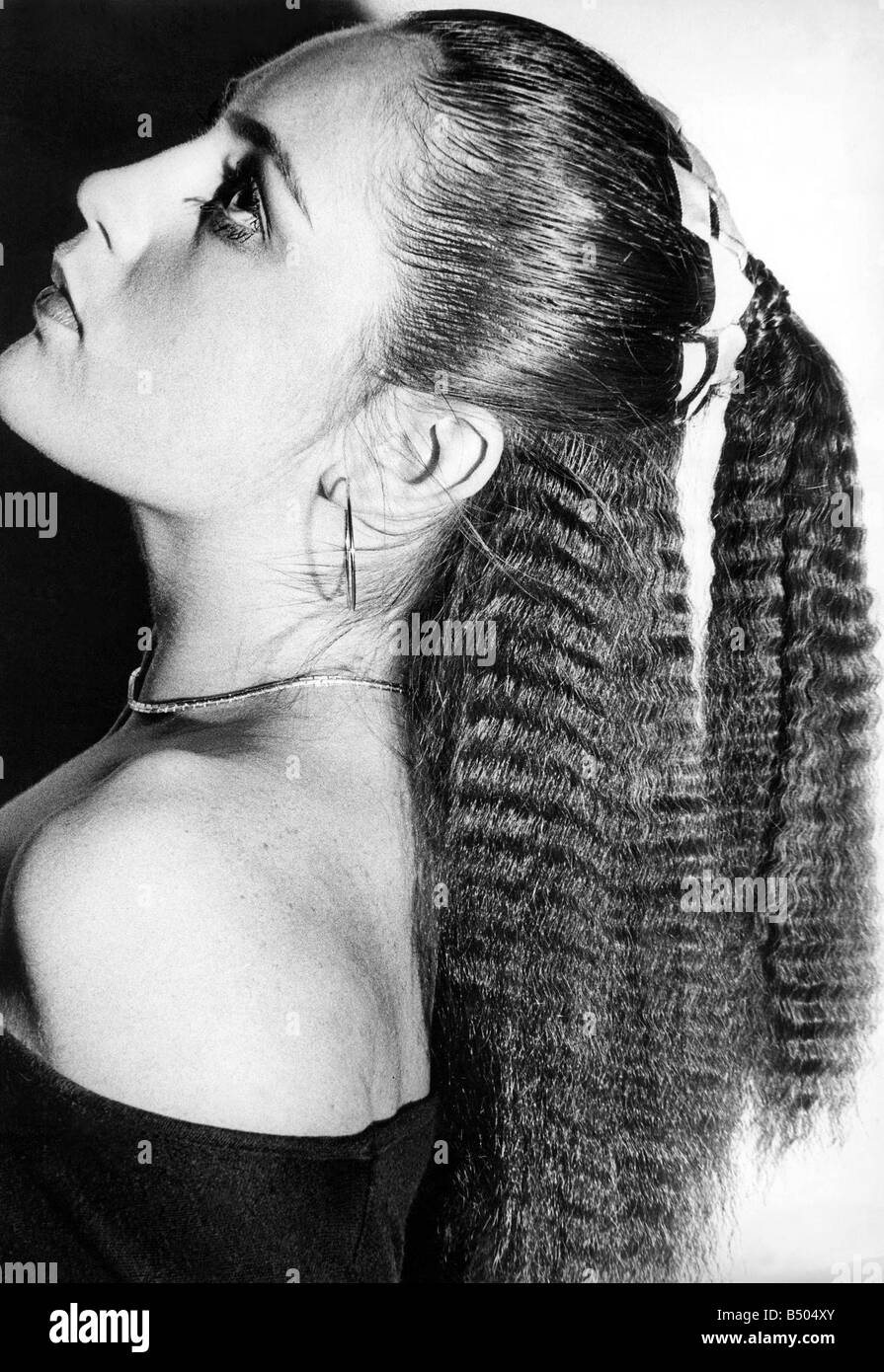 Ladies women s hairstyles hairdressing salons barber crimped Circa 1980 Stock Photo