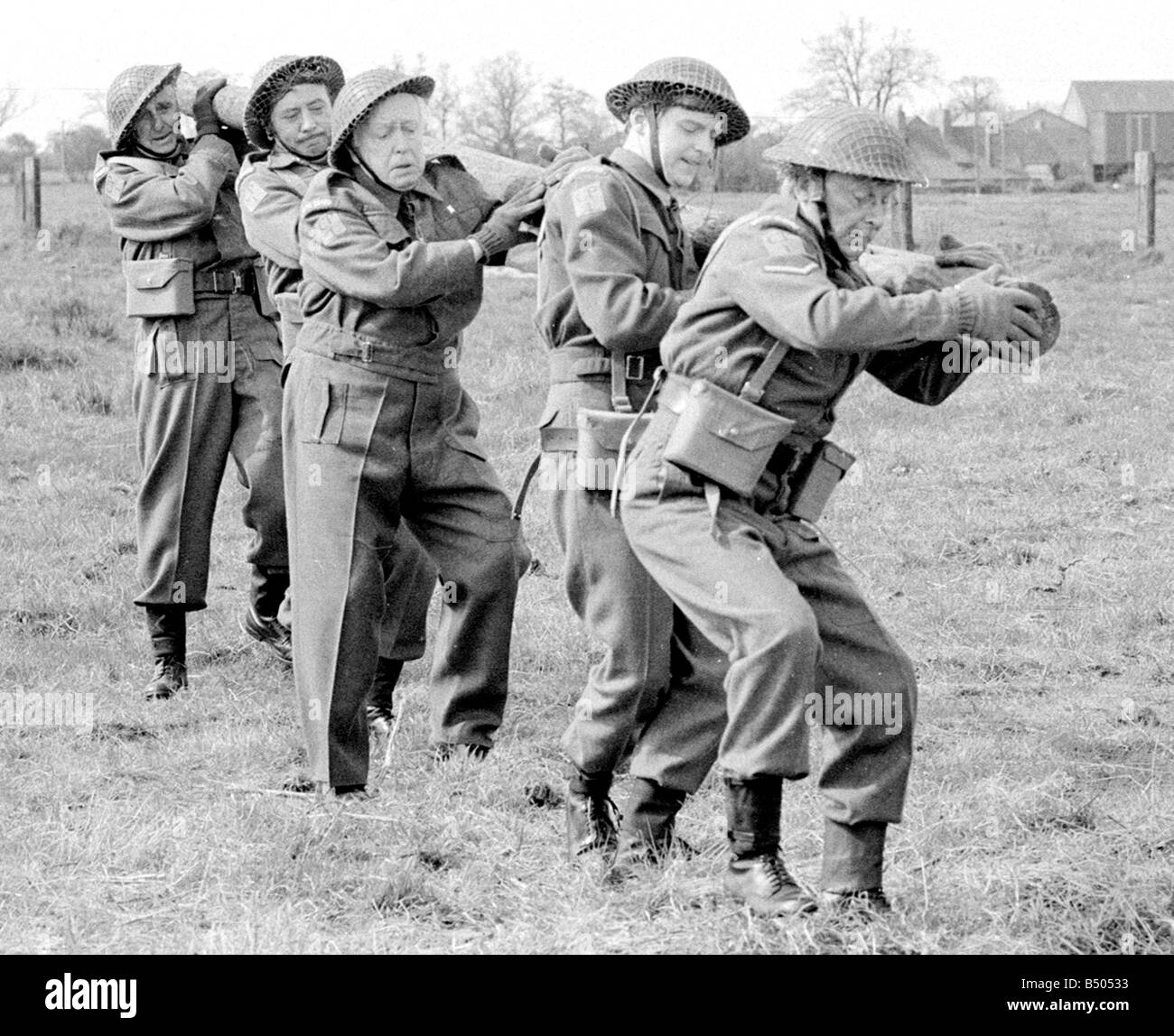 Dads Army ;Actor Clive Dunn who plays Corporal Jones Ian Lavender as pike ,Arnold Ridley as Godfrey, James Beck as Private Walker, John Laurie as Frasier in the BBC TV series Dads Army seen filming on location in Thetford Norfolk.;The cast were filming an assault course scene.;72 4866;©DM Stock Photo