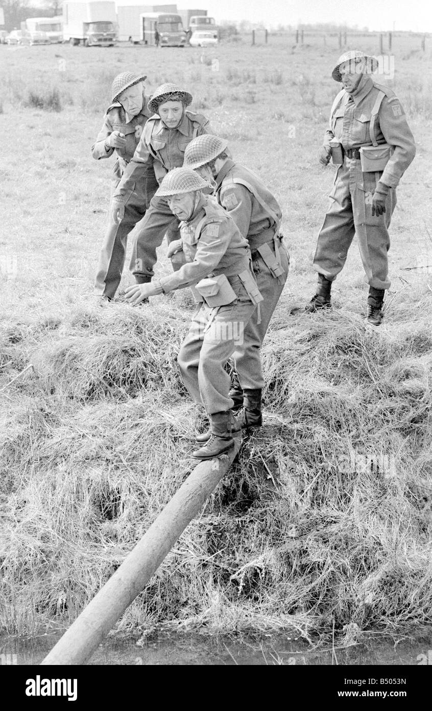 Dads Army ;Actor Clive Dunn who plays Corporal Jones right to left Ian Lavender as pike , James Beck as Private Walker, John Laurie as Frasier and Arnold Ridley as Godfrey in the BBC TV series Dads Army seen filming on location in Thetford Norfolk.;The cast were filming an assault course scene.;72 4866;©DM;Anglia Press for DM Stock Photo