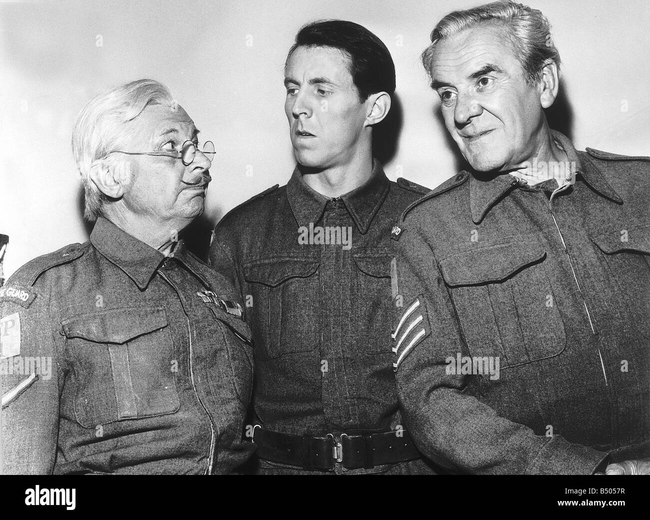 The cast of Dad Army Clive Dunn Graham Hamilton and John Le Mesurier during rehearsals for the BBC comedy Dads Army Stock Photo