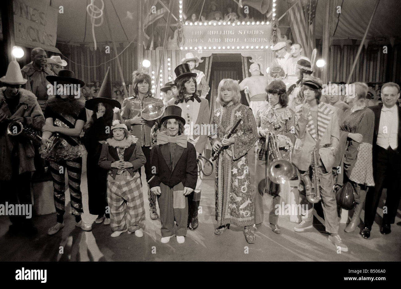 The Rolling Stones December 1968 Pictured after recording their Rock and Roll Circus Show at the Intertel Studios in Wembley London specially recorded for screening over Christmas Mick Jagger Dressed as Ringmaster John Lennon Yoko Ono Keith Richards Charlie Watts Brian Jones Bill Wyman Entertainment Music Studio Groups Circus Performers 1960s Stock Photo