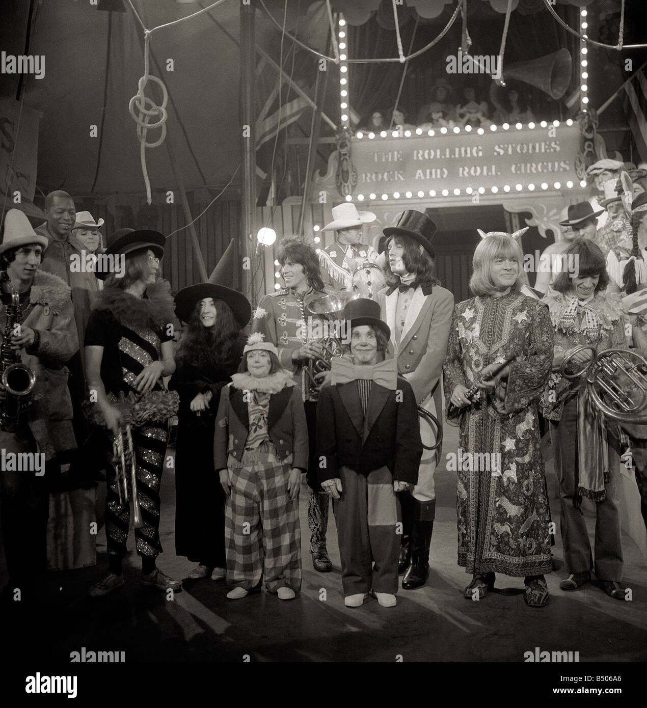 The Rolling Stones December 1968 Pictured after recording their Rock and Roll Circus Show at the Intertel Studios in Wembley London specially recorded for screening over Christmas Mick Jagger Dressed as Ringmaster John Lennon Yoko Ono Keith Richards Charlie Watts Brian Jones Bill Wyman Entertainment Music Studio Groups Circus Performers 1960s Stock Photo