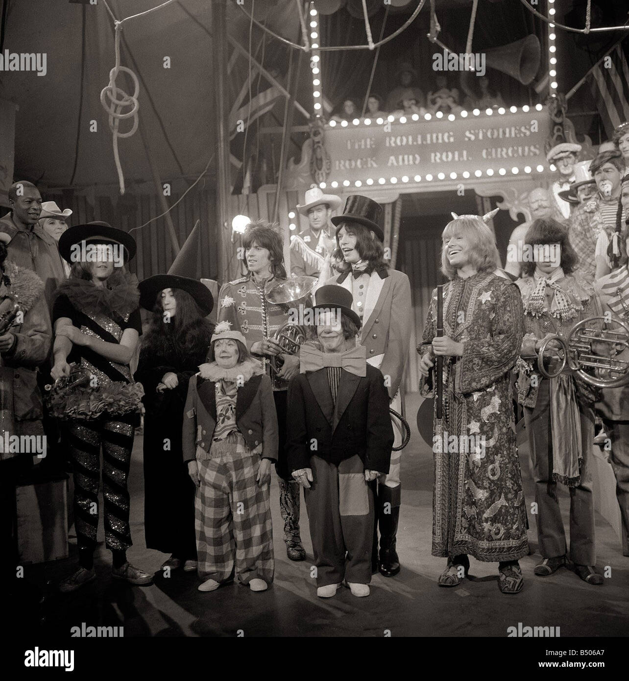 The Rolling Stones December 1968 Pictured after recording their Rock and Roll Circus Show at the Intertel Studios in Wembley London specially recorded for screening over Christmas Mick Jagger Dressed as Ringmaster John Lennon Yoko Ono Keith Richards Charlie Watts Brian Jones Bill Wyman Entertainment Music Studio Groups Circus Performers 1960s Stock Photo