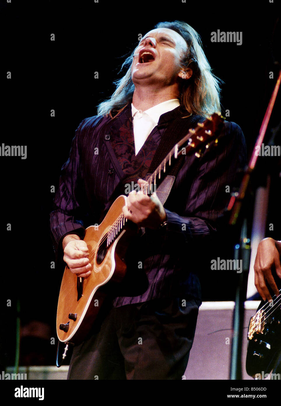 Sting renowned singer and musician playing in concert Stock Photo - Alamy
