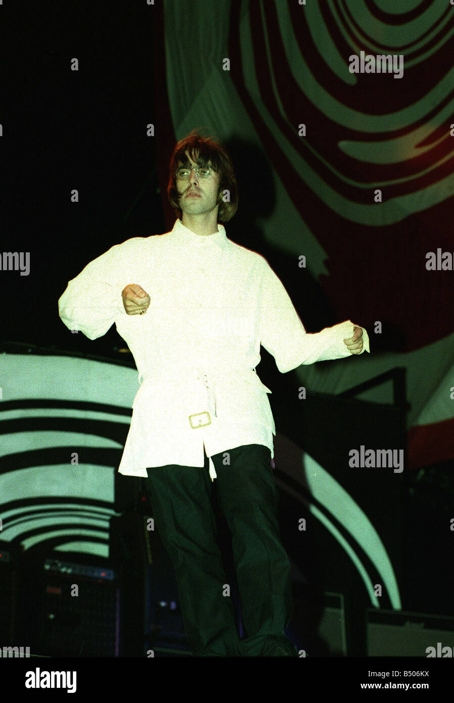Liam Gallagher of Oasis singing at their Knebworth concert Stock Photo