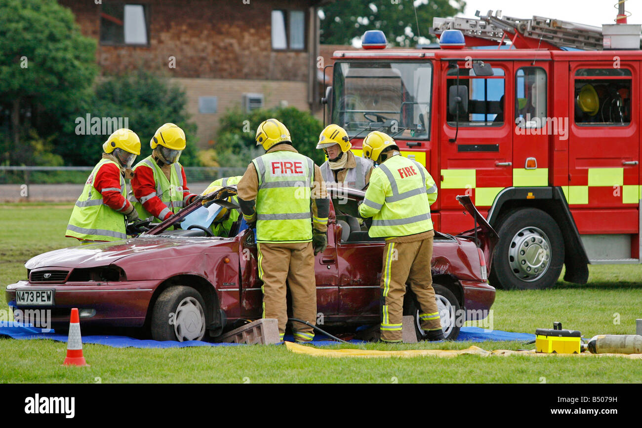 Fire brigade demonstration of cutting the roof off a car in an accident Stock Photo
