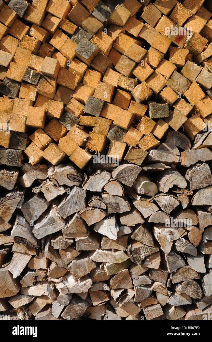Stacked wood. Both seasoned and freshly cut Stock Photo Alamy