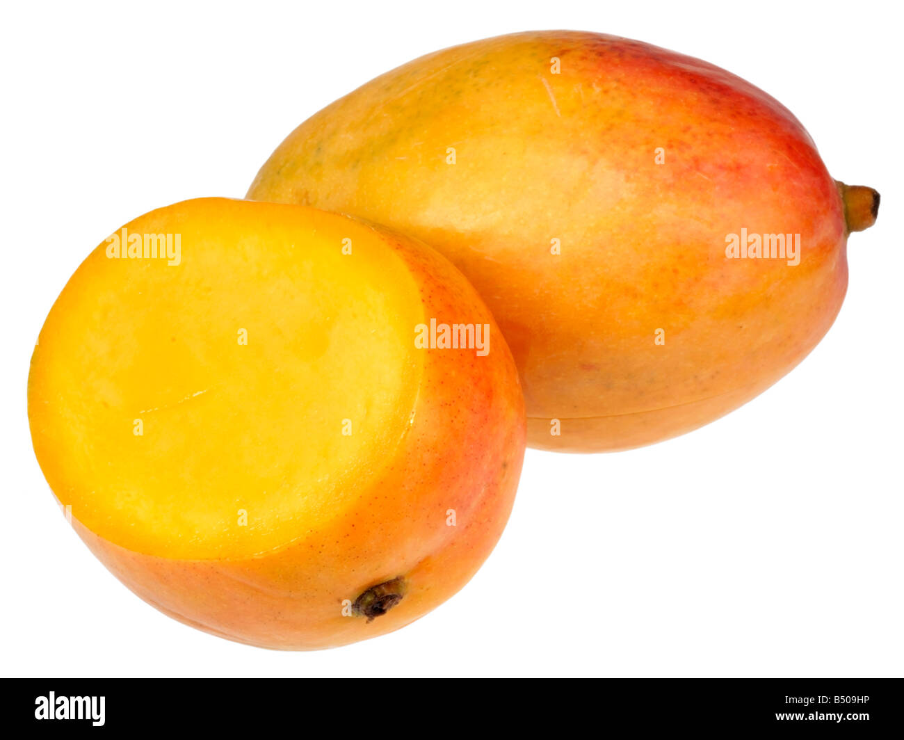 WHOLE AND HALF MANGO CUT OUT Stock Photo Alamy