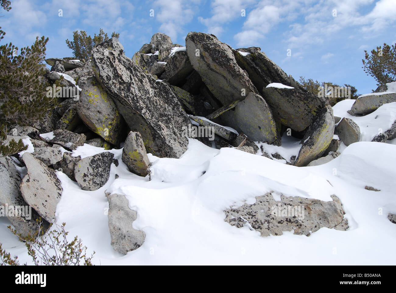 Snow coevered rocks Stock Photo - Alamy