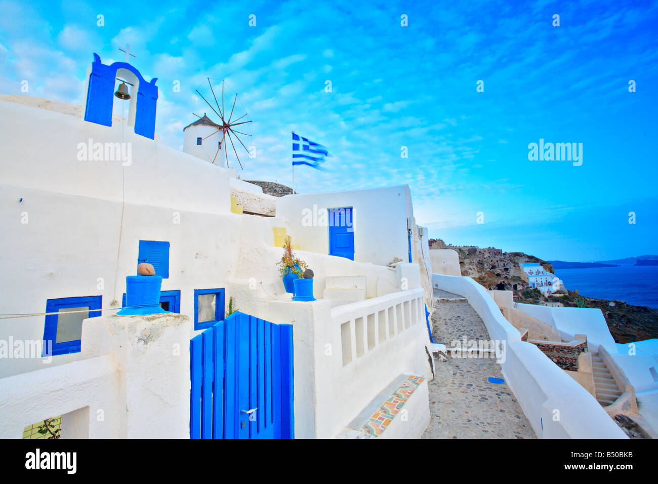 Scene from Oia village on Santorini island Stock Photo - Alamy