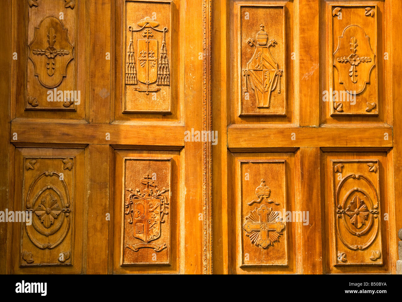 Golden Brown Wooden Church Door with Religious symbols Tlaquepaque Guagalajara Mexico Stock Photo